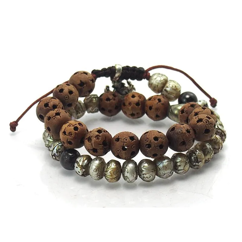 Hand Carved Pearl Wooden Double Wrap Bracelet with Garnet, Pyrite Skull and Sterling Silver Ganesh Amulet